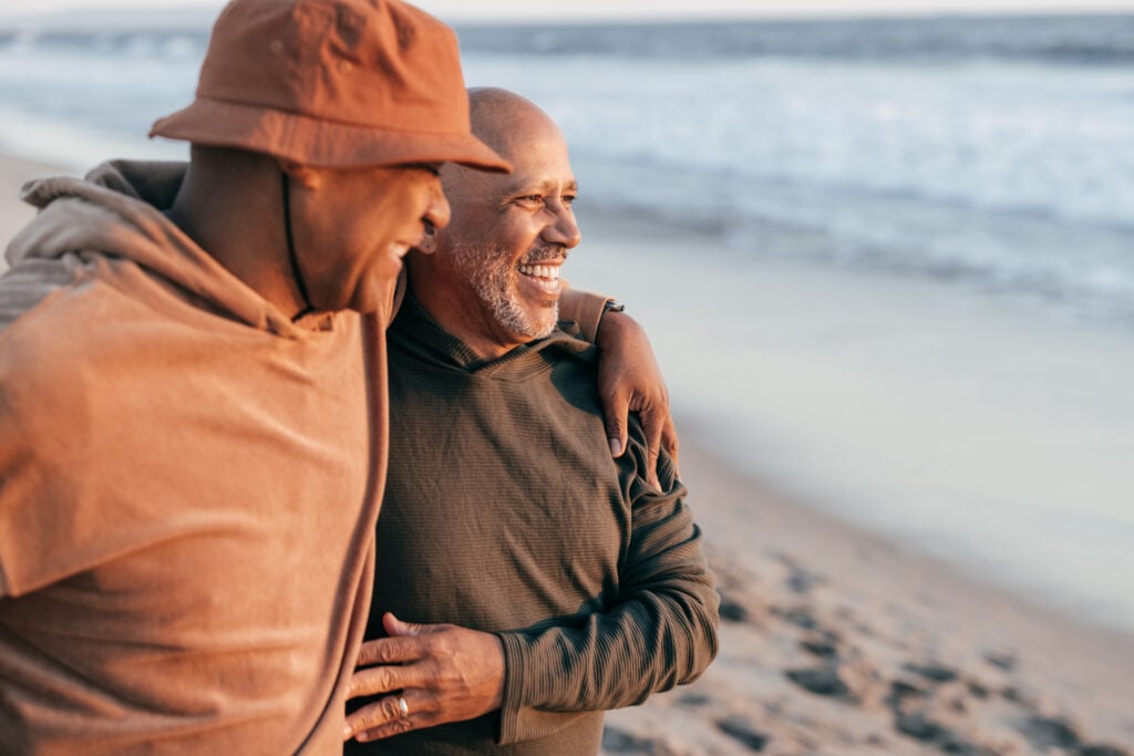 Senior gay couple on the beach